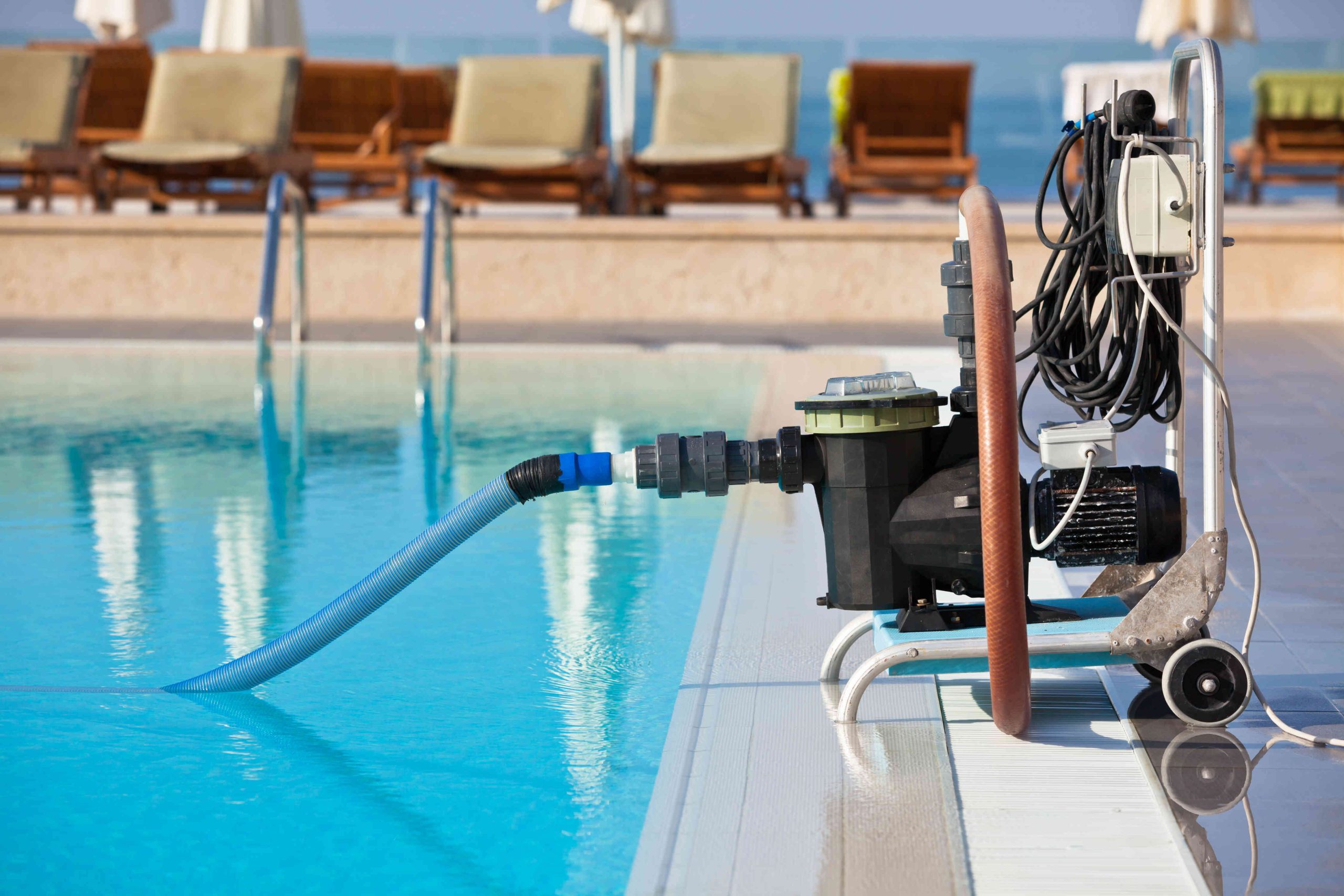 cleaning-pump-working-with-a-swimming-pool-2024-12-16-06-38-16-utc-compressed